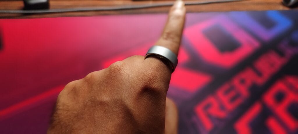 Akshay wearing a smart ring on his index finger during daily health tracking evaluation